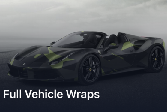 Black and green sports car showcasing full vehicle wrap design.